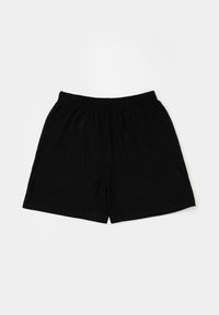 Pantaloni corti neri elasticizzati con vita a elastico, stesi su uno sfondo bianco.