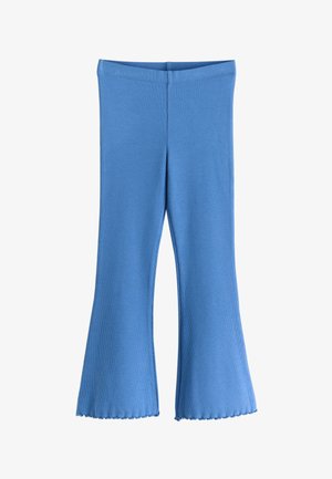 Blå ribstrikkede flarebukser med bølget kant og høj talje, lagt fladt på hvid baggrund.