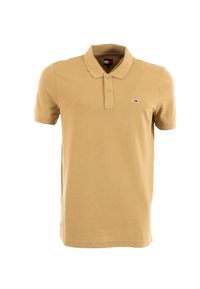 Polo de manga corta en algodón beige, con un cuello clásico, tres botones y un pequeño logo en el lado izquierdo del pecho.