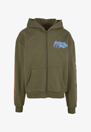 Maslinasto zelena dukserica sa patentnim zatvaračem izrađena od pamuka, s prednjim logotipom, bočnim džepovima i šarenim grafikama na obu izgleda. Glatka tekstura.