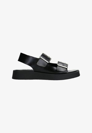 Zwarte leren sandalen met twee verstelbare gespsluitingen, een gladde textuur en een dikke platformzool, ontworpen voor comfort en ondersteuning.