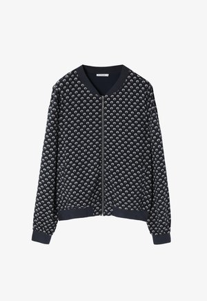 Navy zip-up jacket with a textured floral pattern, ribbed cuffs and hem, and a V-neck collar. Cotton blend fabric, relaxed fit.