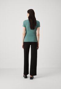 ONLY MATERNITY OLMLIMALA WIDE - Püksid - black