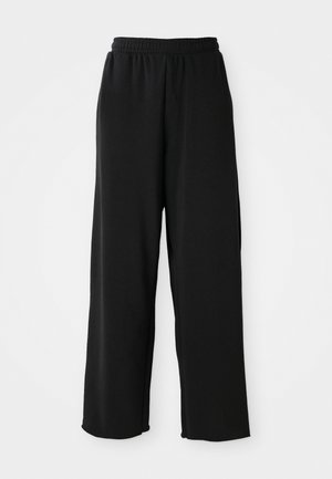 Black wide-leg pants made of soft fabric, featuring an elastic waistband and no visible pockets. Smooth texture with a relaxed fit.