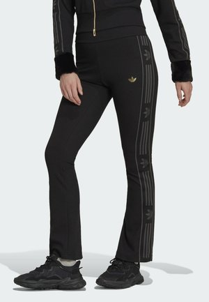 FLARED - Verryttelyhousut - black