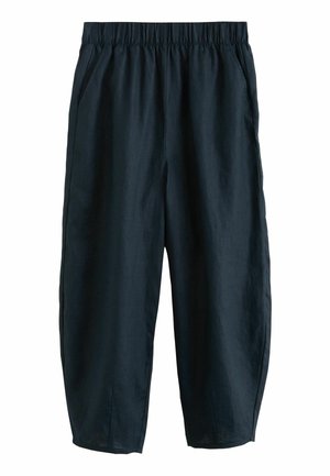 Pantalones negros de corte holgado con cintura elástica y bolsillos laterales, hechos de tela ligera.