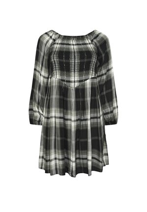 Vestido a cuadros en blanco y negro con mangas largas, escote fruncido y una silueta fluida; confeccionado en una tela ligera con un acabado texturizado.