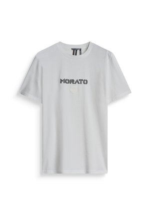 White cotton t-shirt featuring black text "MORATO" with striped accents and a subtle white floral logo beneath. Short sleeves, crew neck.
