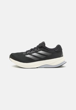adidas Performance SUPERNOVA SOLUTION - Road running shoes - core black/carbon
