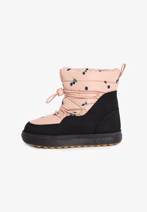 Botte d'hiver pour enfants avec une tige rose ornée de petits motifs de feuilles bleu foncé et vert, partie inférieure noire et semelle épaisse en caoutchouc.