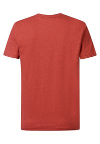 Červené tričko s krátkým rukávem a kulatým výstřihem. Vyrobeno z měkké, mírně texturované látky. Má hladký zadní design, bez vzorů nebo grafik.