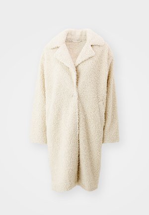 Cream-colored, fluffy faux fur coat with a large collar, open front, and three-quarter sleeves. Features two side pockets and a relaxed fit.