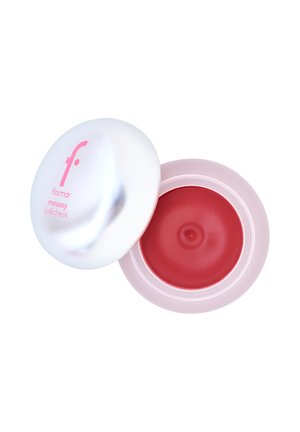 Small round container of red mousse lip and cheek makeup with a white lid labeled Flormar moussy lip&cheek.