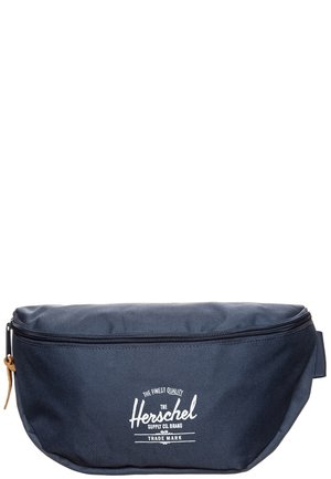 Navy blue Herschel zippered fabric waist bag with front white logo and leather zipper pull tab.