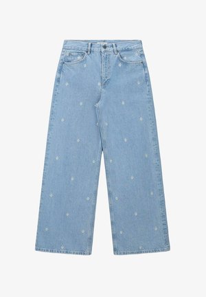 Light blue wide-leg jeans with white star embroidery. Features a classic five-pocket design and button closure with zipper fly.