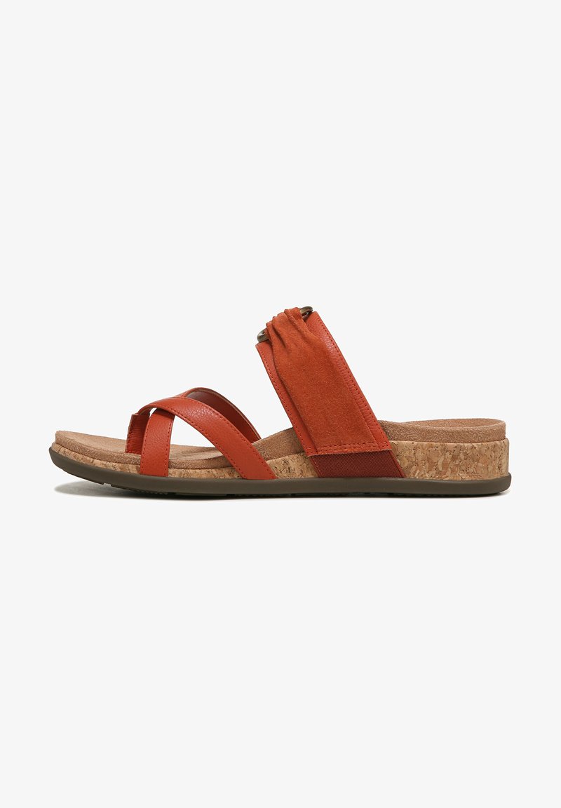 Orange leather sandal with crossed straps and a textured upper. Cork footbed and rubber sole provide comfort and grip.