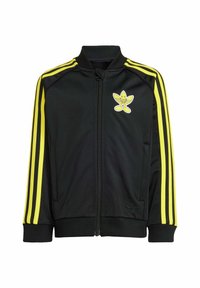 Black zip-up jacket with yellow stripes on sleeves, ribbed cuffs and hem, and a banana logo on the chest. Made from smooth polyester material.