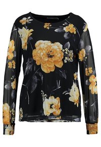 Schwarzes, blumenmusterndesLangarmshirt mit großen gelben Blumen und grünen Blättern. Weicher, transparenter Stoff mit gerafften Ärmeln.