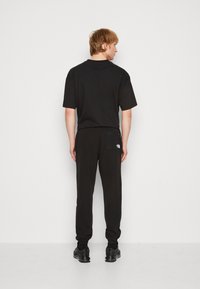 The North Face TECH PANT - Træningsbukser - black