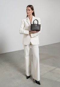 Isabel Bernard Handtasche - braun