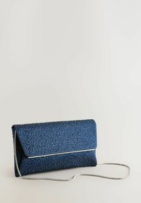 Blue clutch bag with a textured surface featuring raised bead-like embellishments, a fold-over design, and a silver chain strap.