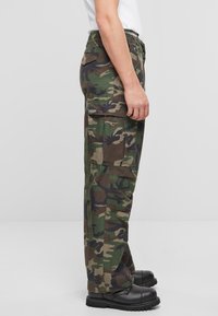 Brandit VINTAGE - Pantalon cargo - olive camo