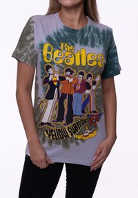Gray tie-dye t-shirt featuring a colorful graphic of The Beatles with the text "Yellow Submarine." Made of soft cotton.