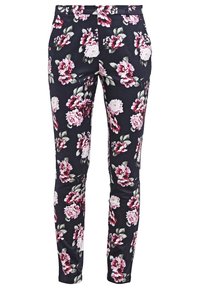 Kalhoty s květinovým vzorem v černé barvě s velkými růžovými a bílými růžemi. Slim fit design s hladkou texturou a standardním pasem.