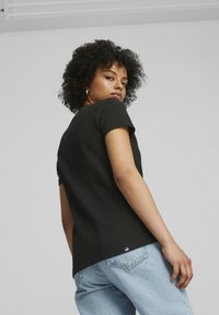 Puma T-shirt basique - schwarz