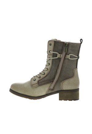 Bottine à lacets en cuir texturé beige clair avec des côtés à motif pied-de-poule et une fermeture éclair. Talon carré pour plus de stabilité.