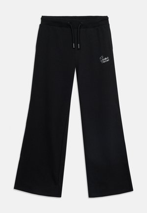 Pantalon noir à jambes larges avec taille élastique et cordon, avec petit logo blanc "Guess EST.1981" sur la cuisse gauche.