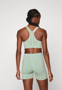 ICANIWILL RUSH SEAMLESS BRA - Sujetadores deportivos con sujeción media - ice green melange