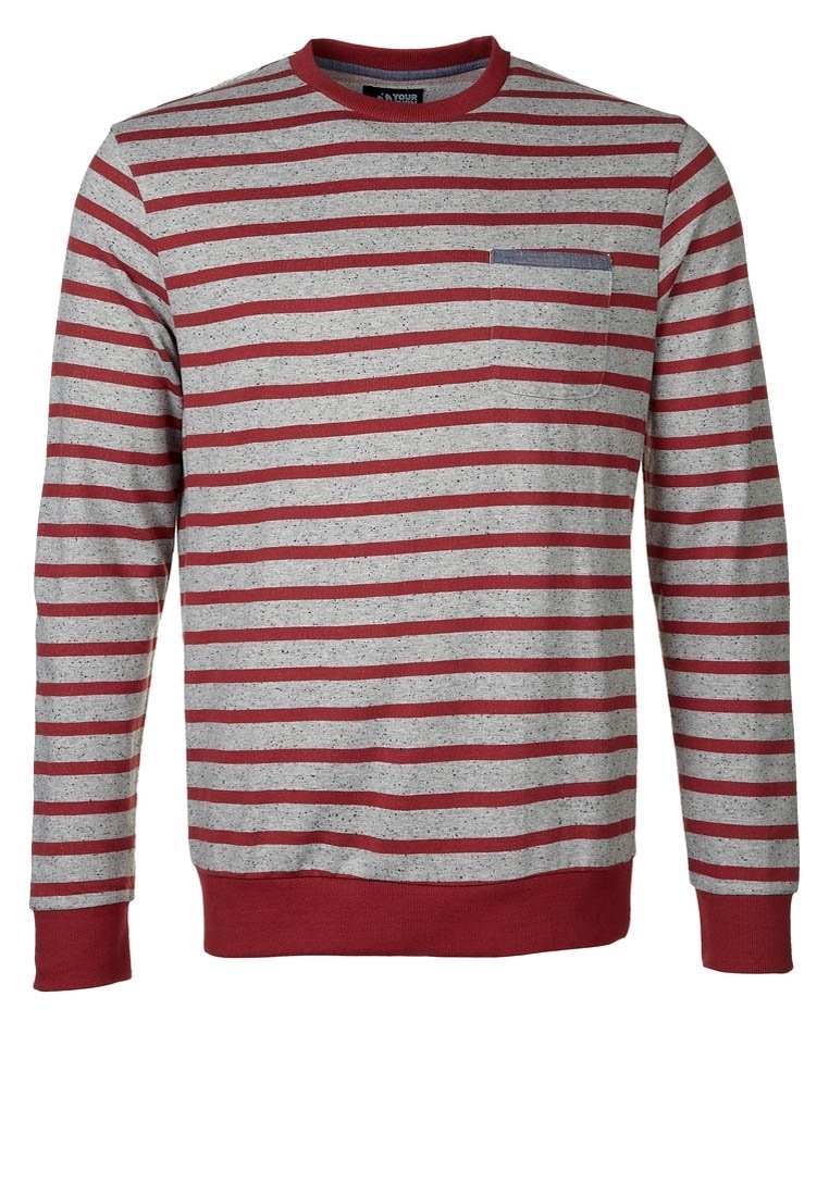 Sukienka z paskami o szarym korpusie, czerwonych poziomych paskach i małej kieszeni na piersi. Wykonana z teksturowanej tkaniny z prążkowanymi mankietami i dekoltem.