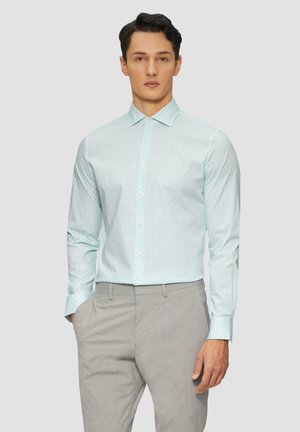Licht mintgroen overhemd met lange mouwen en een geometrisch patroon, voorzien van een button-down kraag en knoopsluiting aan de voorkant. Kreukvrije stof.