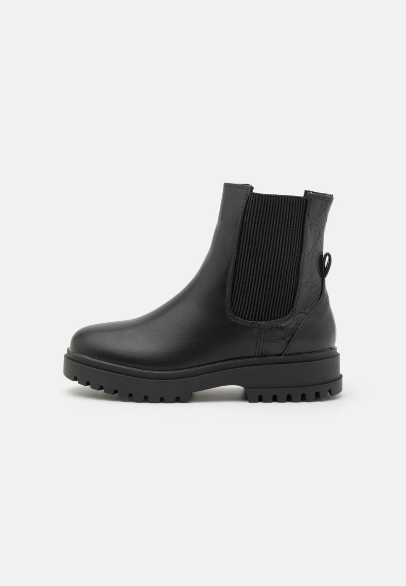 Black leather ankle boots with ribbed elastic side panels, textured accents, and a rugged outsole for grip. Rounded toe and pull tab design.