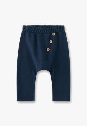 Marineblaue Baumwollhose mit elastischem Bund, diagonalem Knopfverschluss mit drei Holzknöpfen und schmal zulaufendem Bein.