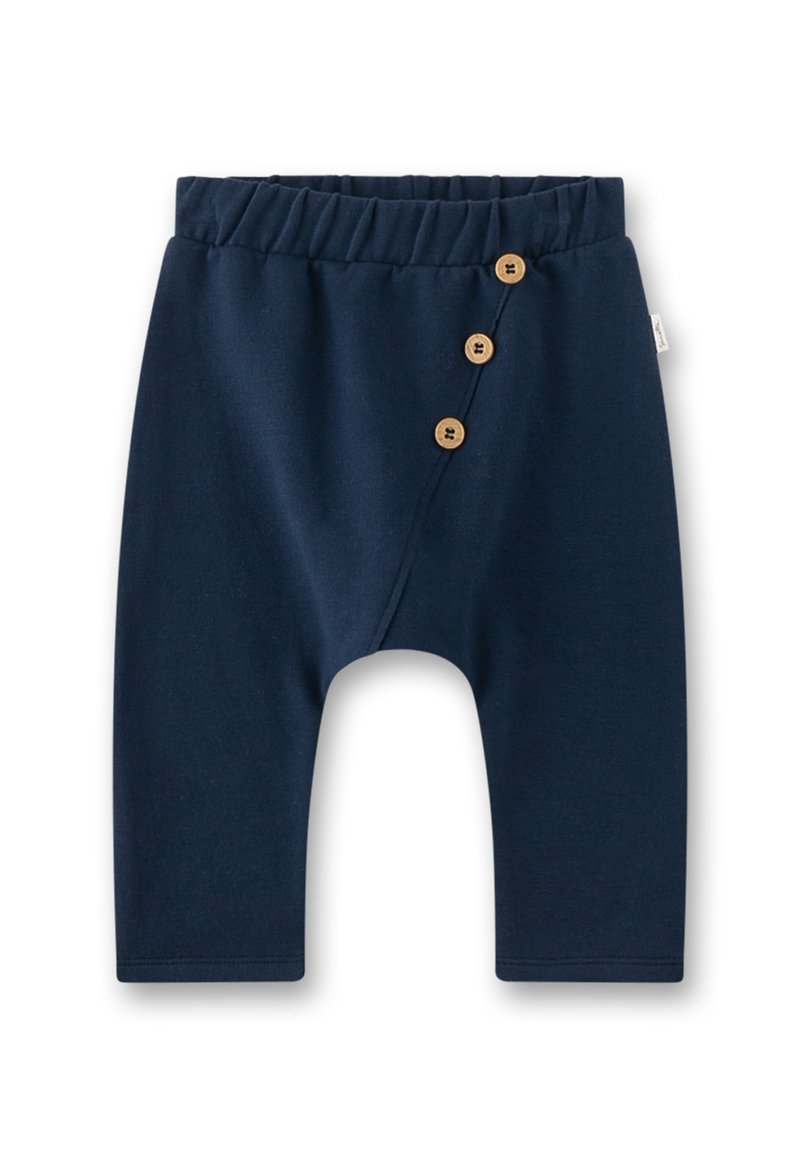 Marineblaue Baumwollhose mit elastischem Bund, diagonalem Knopfverschluss mit drei Holzknöpfen und schmal zulaufendem Bein.