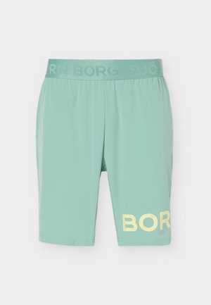 Pantaloncini sportivi verde chiaro con vita elastica e scritta parziale gialla "BORG" sulla parte inferiore della gamba sinistra.