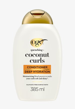 OGX Coconut Curls conditionerfles met gouden flipdop, bestempeld voor diepe hydratatie, hydraterende mix, sulfaatvrij, inhoud 385 ml.