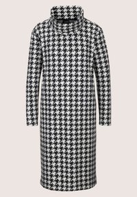 Kleid mit Schwarz-Weiß-Hahnentrittmuster, hohem, gefaltetem Kragen und langen Ärmeln. Aus strukturiertem Stoff, knielanger Schnitt.