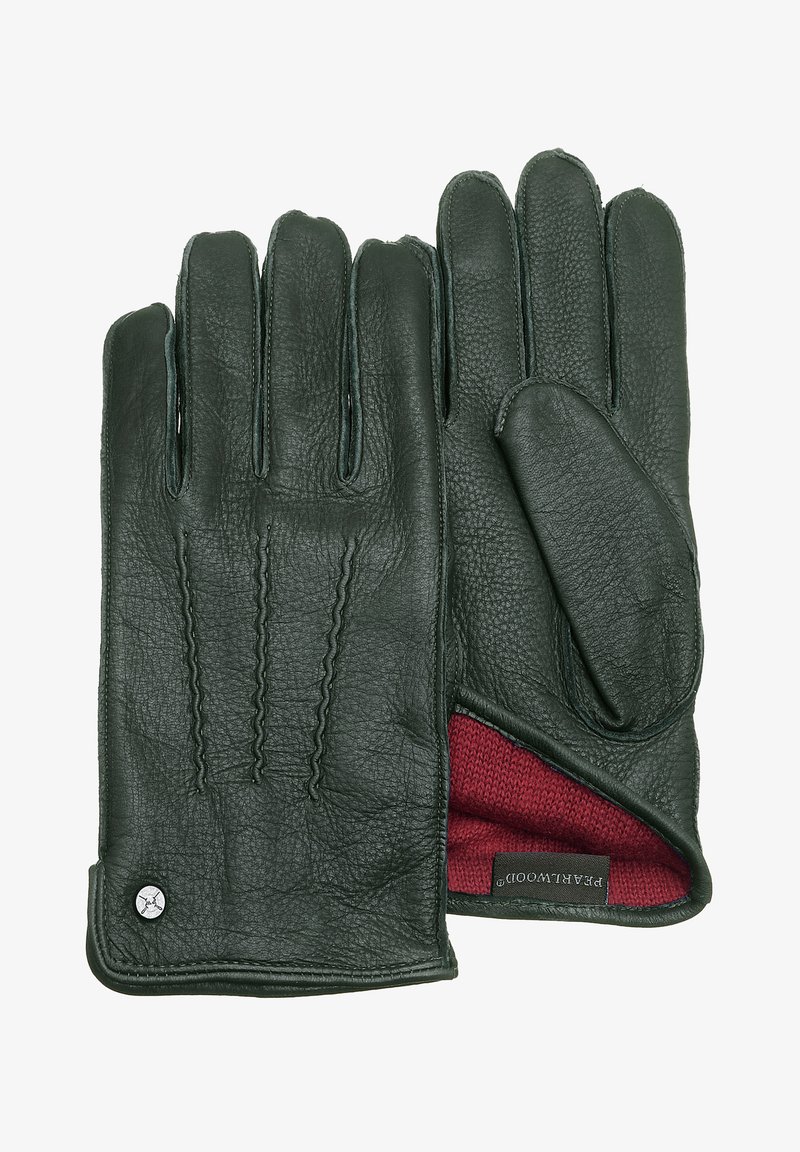 Mörkgröna läderhandskar med en texturerad yta, röd stickad foder och dekorativt sömnad på baksidan. Inkluderar en varumärkesskylt.