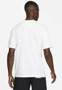 Nike Performance PRIMARY  biały