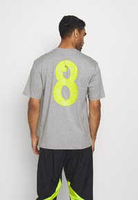 adidas Performance LUCKY 8 GRAPHIC - T-Shirt print - mottled grey