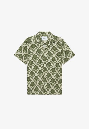 Trumpetaukis su trumpomis rankovėmis, su žaliu gėlių raštu ant šviesiai smėlinio fono. Su apykakle ir etikete „Les Deux“.