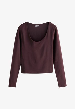 Burgundy long-sleeve top with a wide scoop neckline and cropped design, made of soft fabric with a smooth texture. Brand label visible.