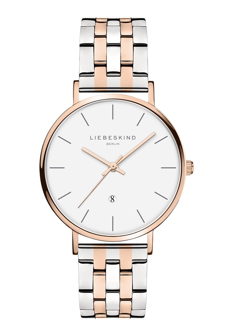 Runde Uhr mit weißem Zifferblatt, roségoldenen Zeigern und einem Metallarmband in Silber/Roségold mit abwechselnden Gliedern. Dezente Datumsanzeige bei 6 Uhr.