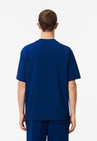 Lacoste Camiseta estampada - bleu hbm