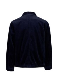 Veste en velours côtelé bleu marine foncé à manches longues avec ourlet élastique, vue de dos sur fond blanc.