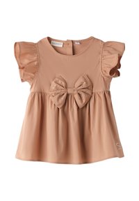 Maglietta per bambini color pesca con maniche arricciate, corpino raccolto e un grande fiocco adornato con piccoli strass al centro.