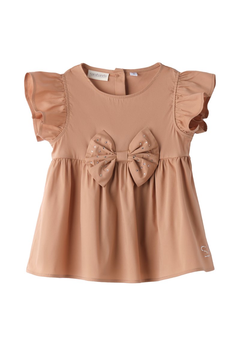 Maglietta per bambini color pesca con maniche arricciate, corpino raccolto e un grande fiocco adornato con piccoli strass al centro.